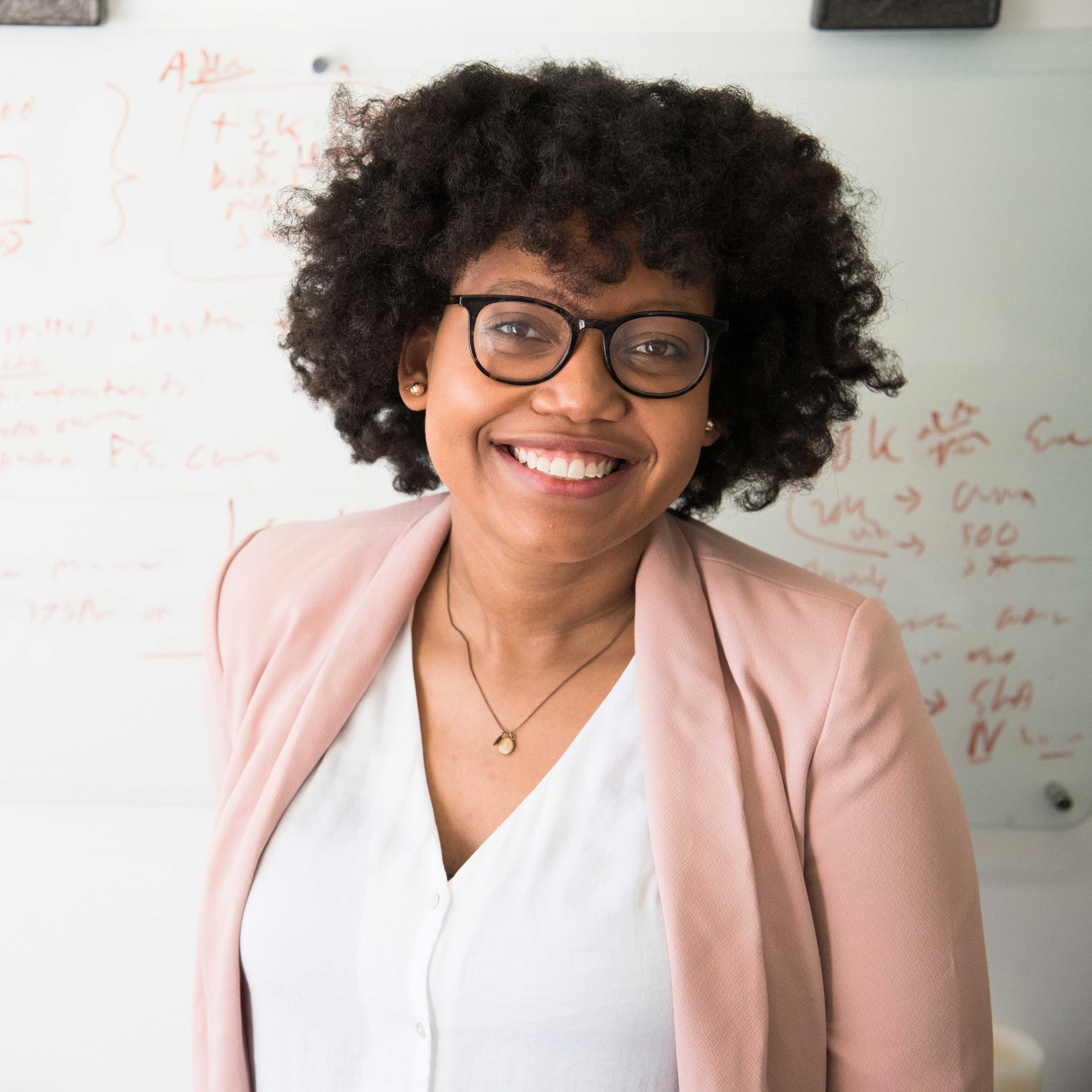 A woman smiling.